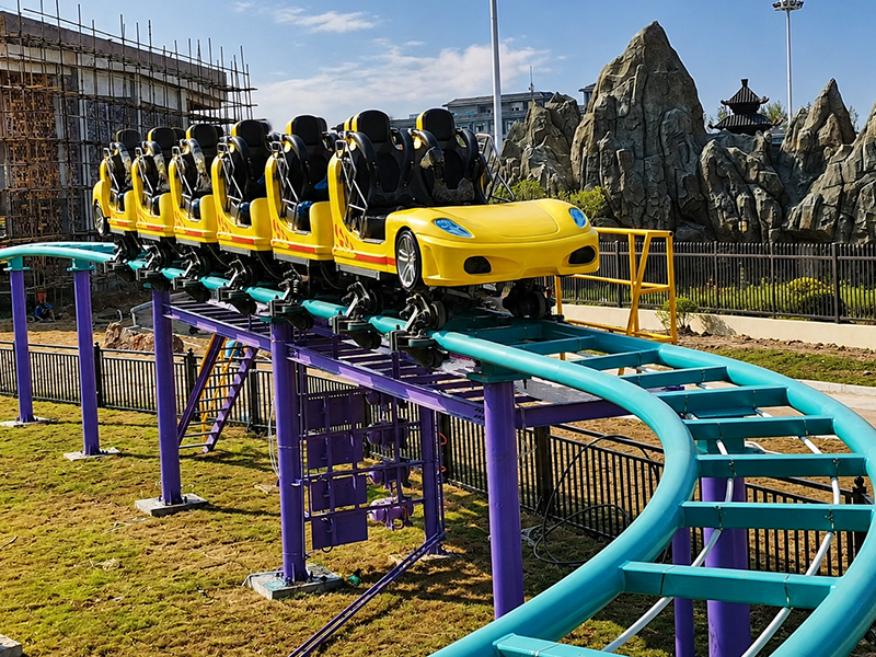 How Should You Position a Sports Car Family Coaster Within a Family Amusement Zone?